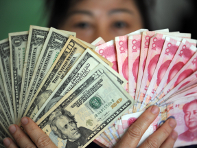 人民幣兌美元中間價報7.0753，較昨日中間價升20點子。（新華社資料圖片）