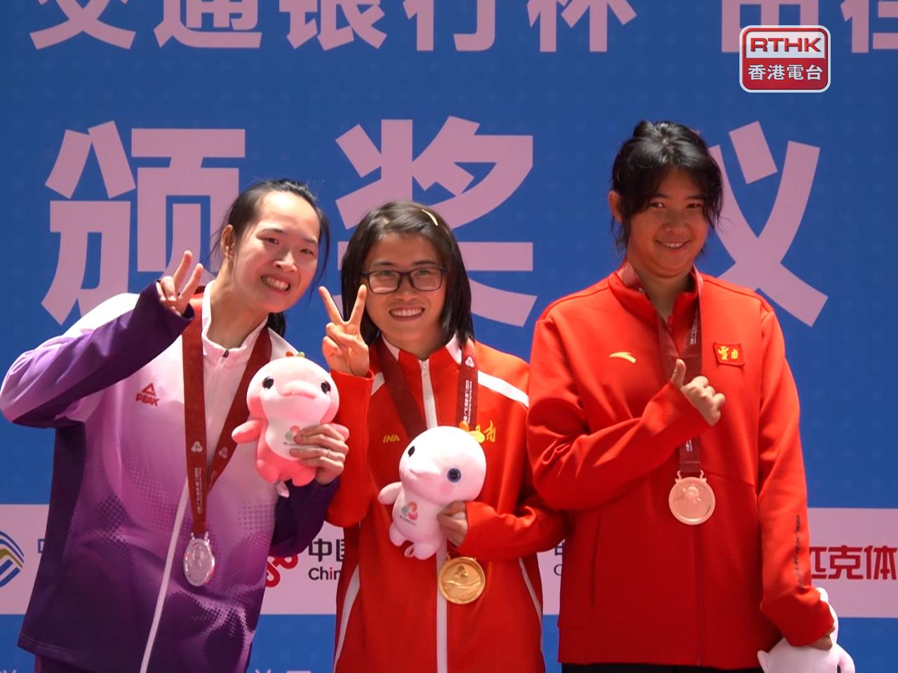 Yam Kwok-fan, left, wins a silver medal, a day after coming second in the 100 metres. File photo: RTHK