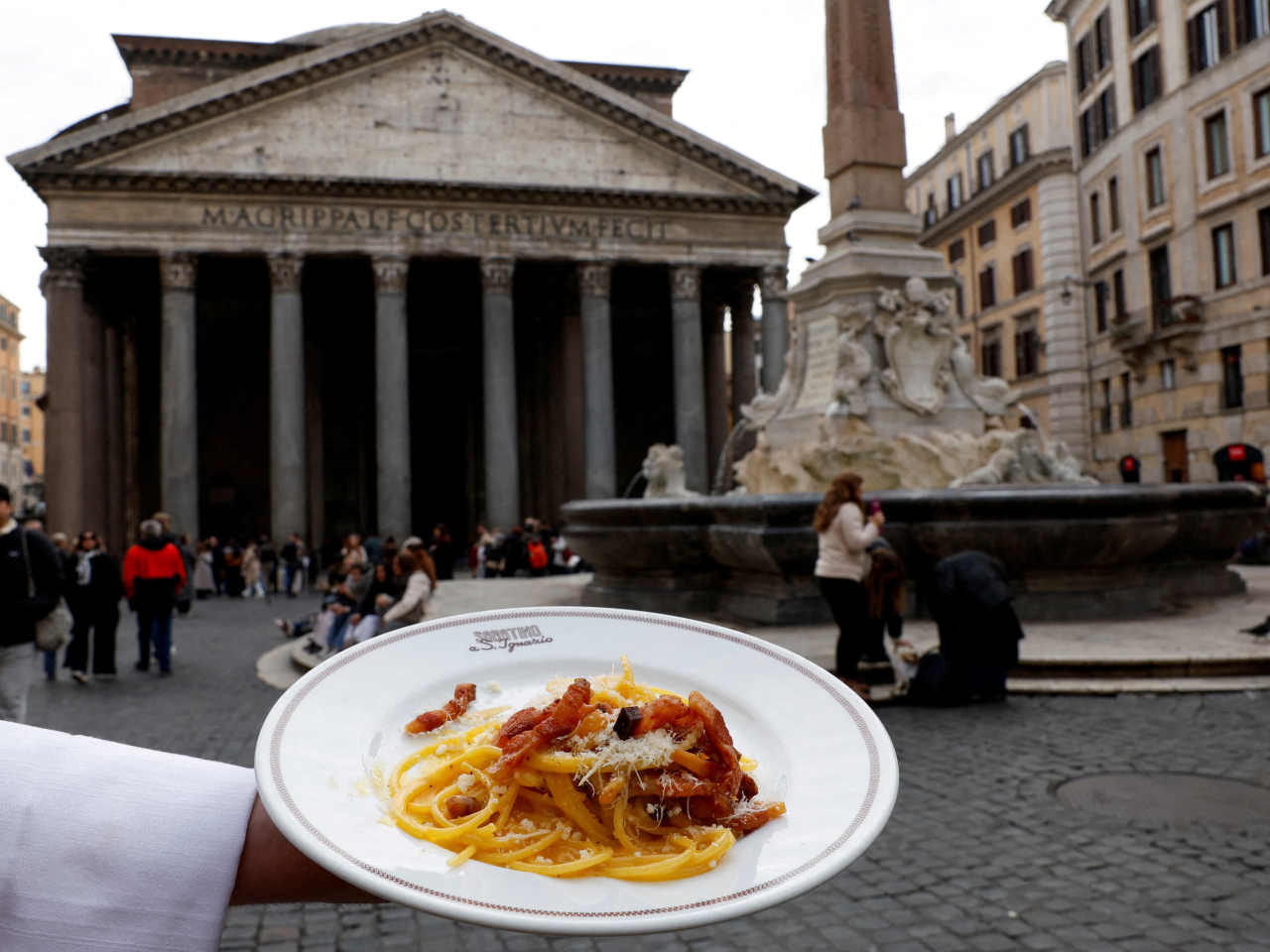 "Today, wherever you go in the world, everyone knows the word spaghetti. Everyone knows pizza," says Francesco Lenzi, a pasta maker from Rome. Photo: Reuters