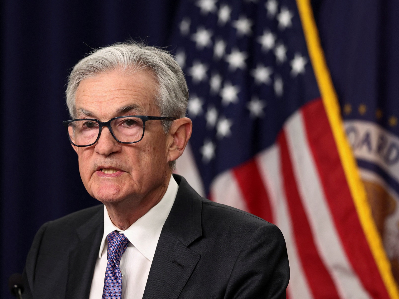 Fed Chair Jerome Powell signaled a higher bar for future reductions, saying the central bank is "well positioned to wait and see how the economy evolves from here." Photo: Reuters