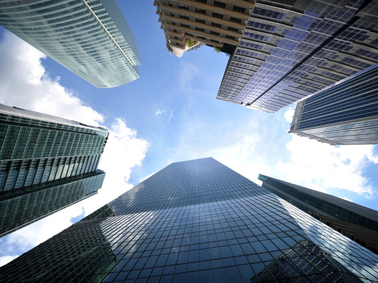 Hongkong Land says its interest in One Raffles Quay, foreground, will be moved to the new fund. File photo: AFP