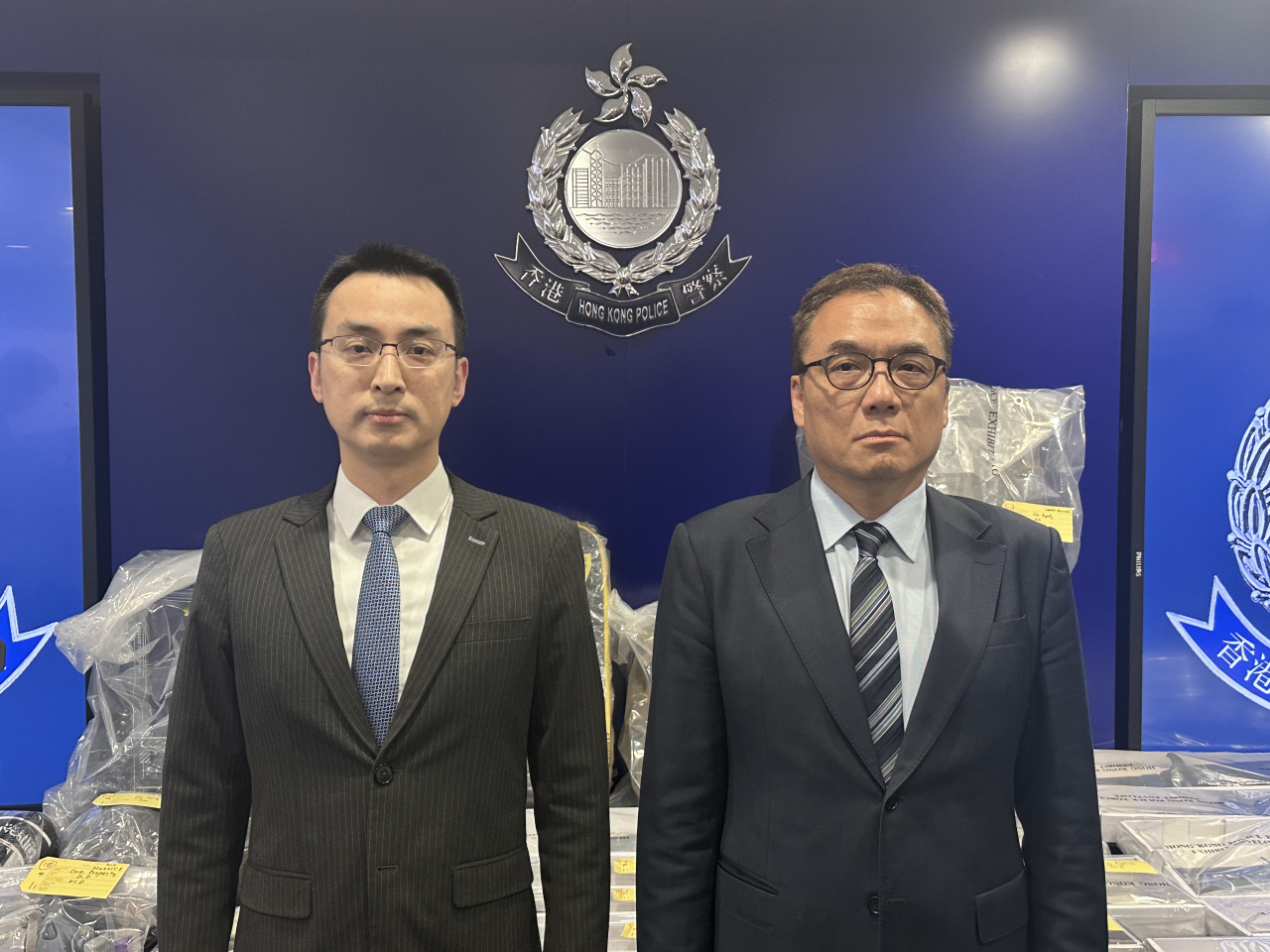 Steve Li, right, says military-type training was offered at the industrial unit. Photo: RTHK