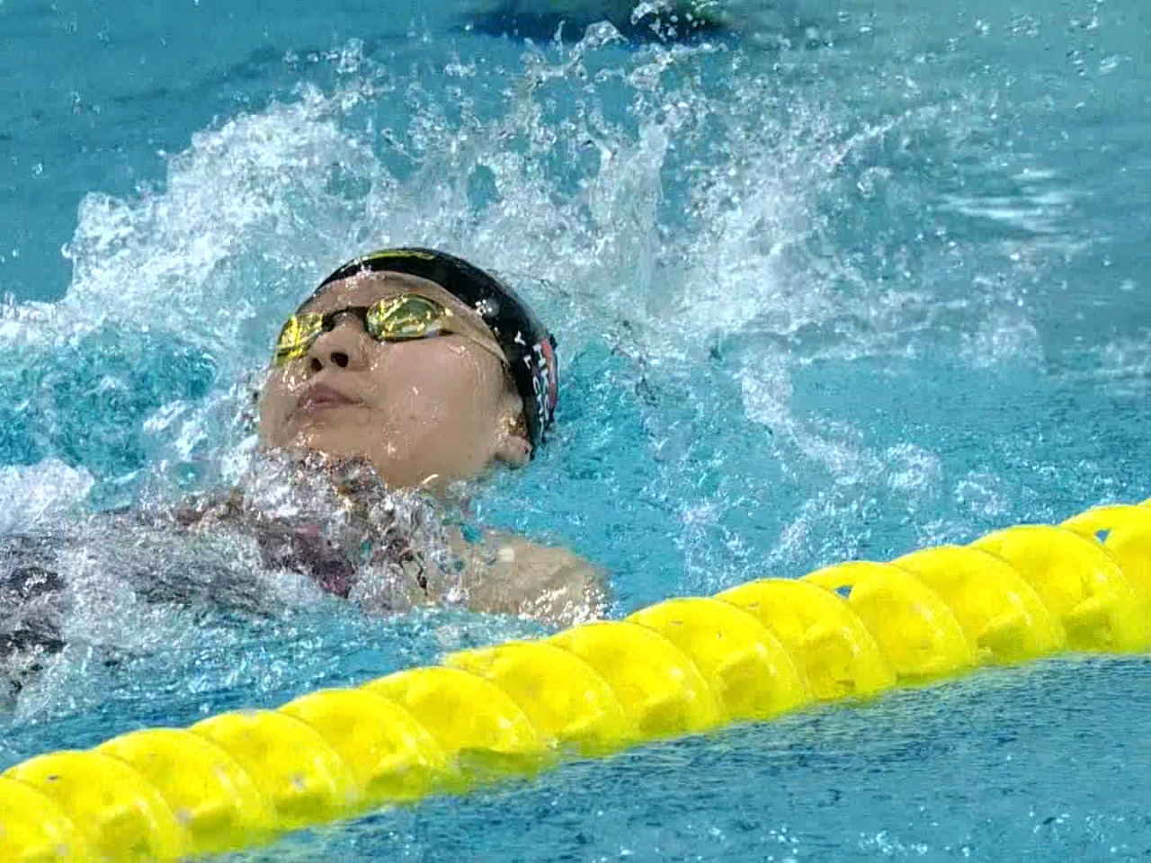 陳睿琳在女子100米背泳S14決賽，以破全國紀錄的成績取得金牌。