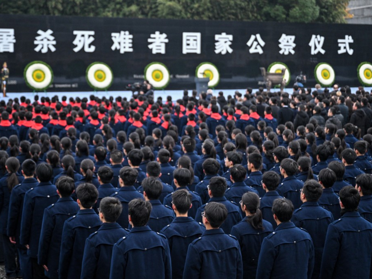The Nanjing Massacre is marked with a solemn ceremony at the city's national memorial centre. Photo: Reuters