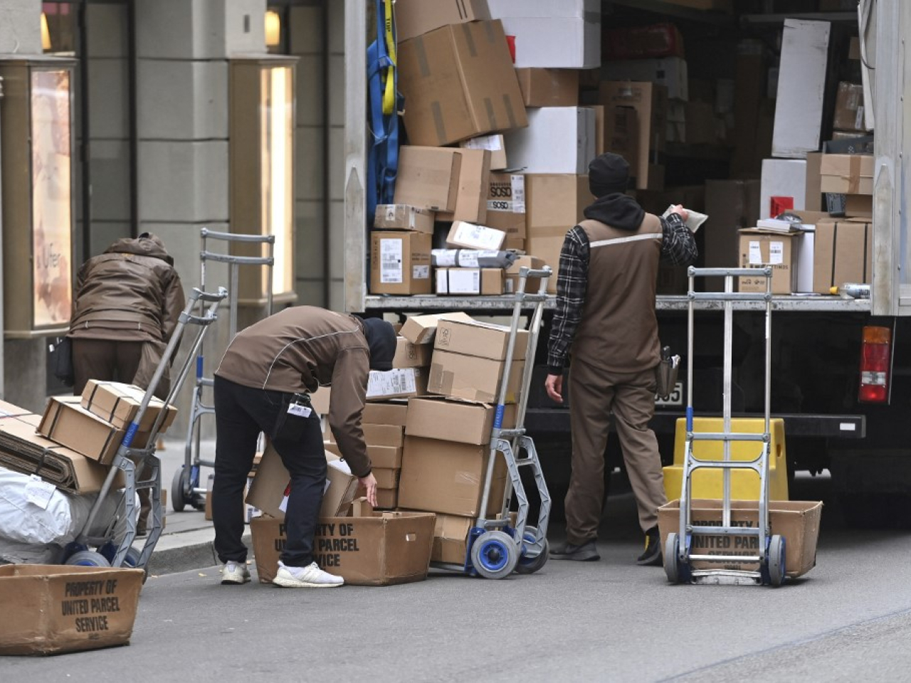 UPS is alleged to have not paid its seasonal delivery workers for labour before and after shifts as well as during meal breaks. File photo: AFP