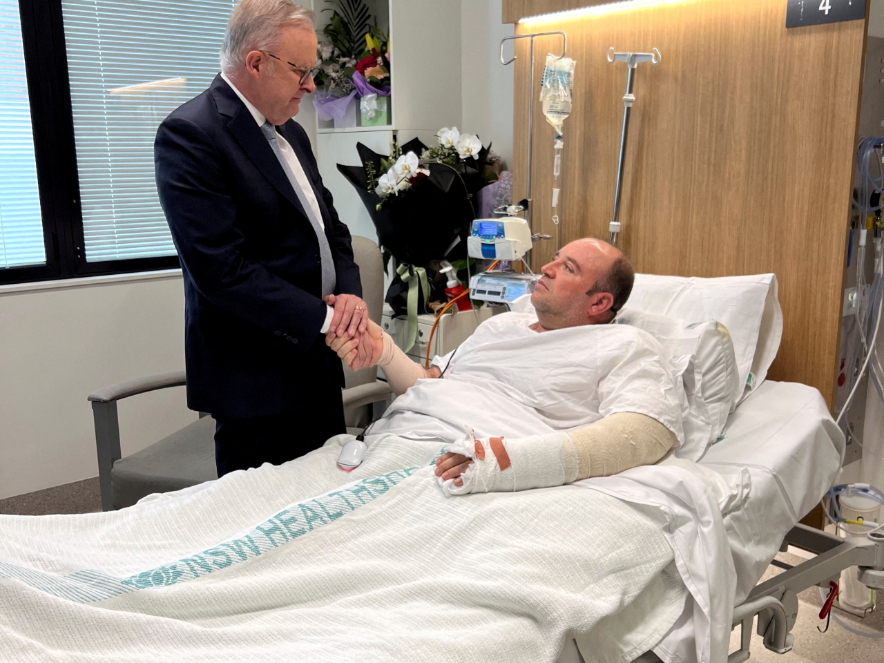Prime Minister Anthony Albanese visits Bondi Beach hero Ahmed al Ahmed in hospital. Photo: Reuters