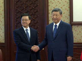 Xi affirms HK's work, offers sympathy to fire victims