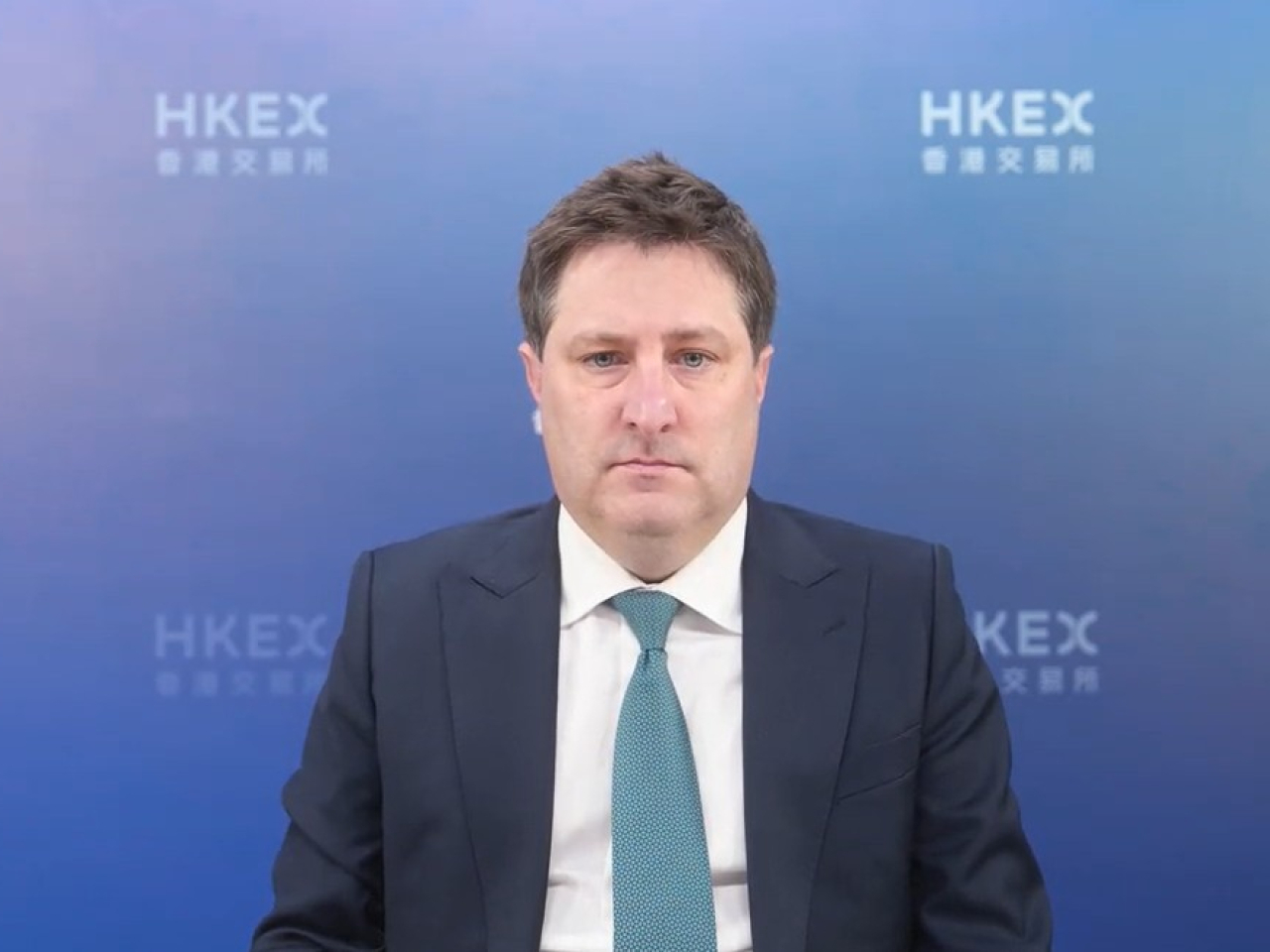 羅博仁說，要統一每手股數，前題是市場交易成本結構及股價分布需要改變。（網上會議截圖）