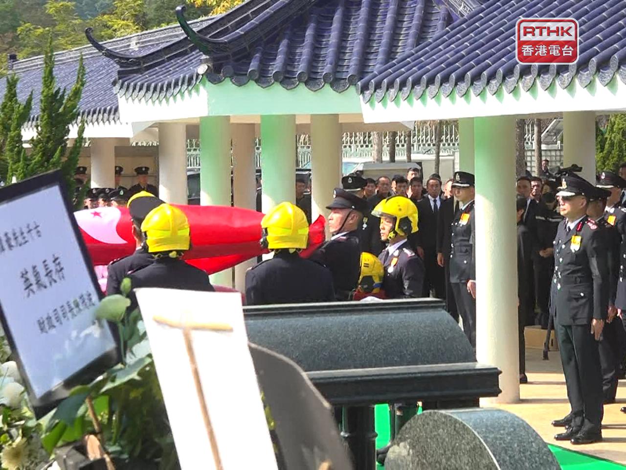 At Gallant Garden, one firefighter carried Ho&rsquo;s helmet as others guided his coffin to its final resting place, followed by his family and loved ones. Photo: RTHK