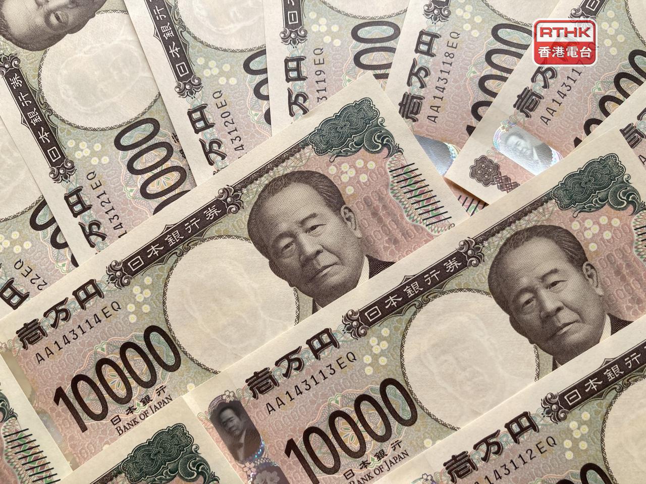 日本加息0.25厘，基準利率升至0.75厘。議息結果公布後，日圓兌美元失守156關口。（港台圖片）