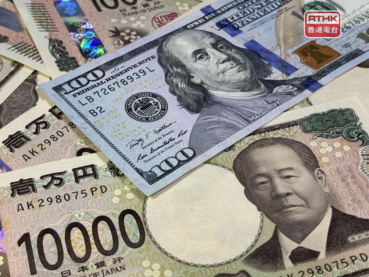 日圓兌美元跌逾1%，失守157日圓水平，低見157.77日圓，創近1個月低位。（港台圖片）
