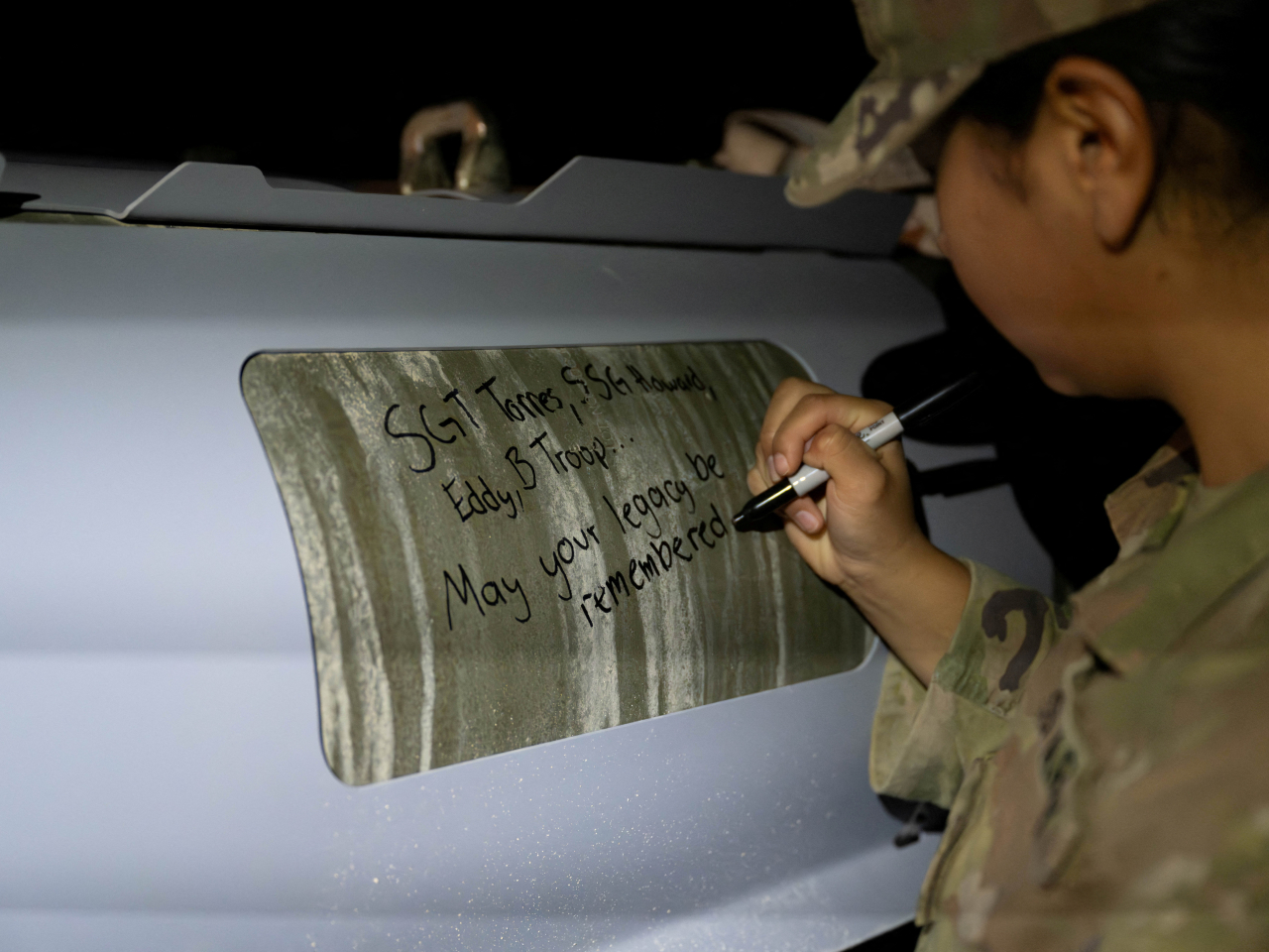 A message is written on a smart bomb to be used in the US strikes on Syria that references one of the soldiers killed in the ambush blamed on IS. Photo: Reuters