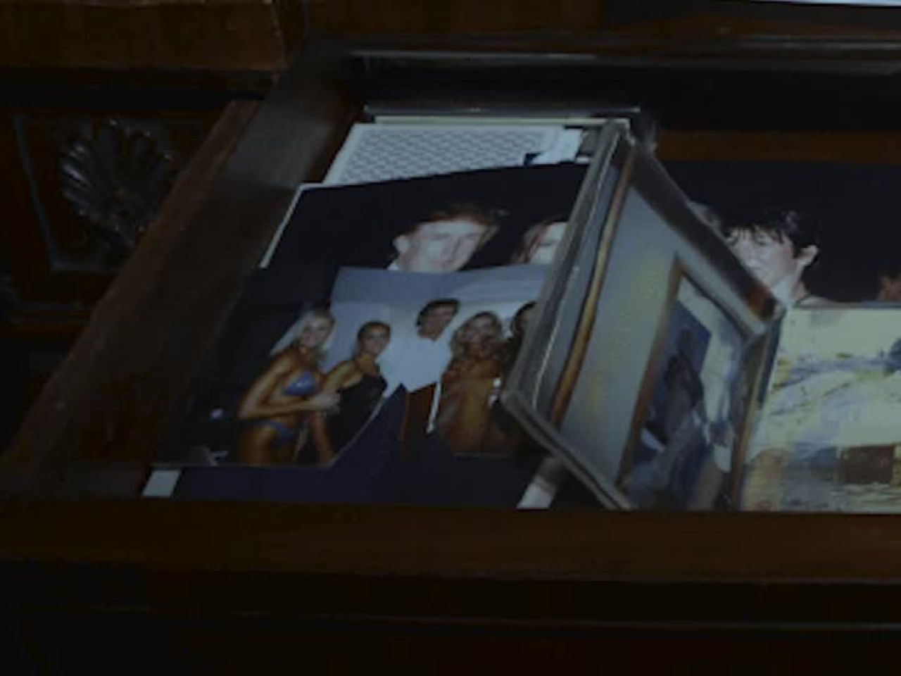 The photo that was removed and later restored to a US Justice Department website showed Donald Trump with various women. Photo: Reuters