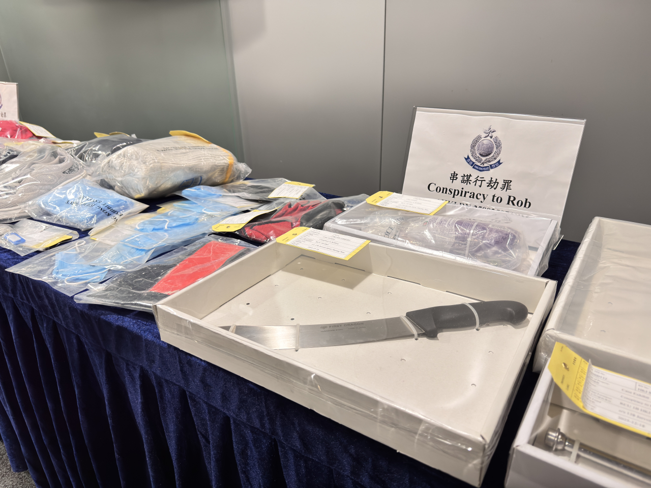A 20-centimetre knife allegedly used in the robbery is among the items seized by the police. Photo: RTHK