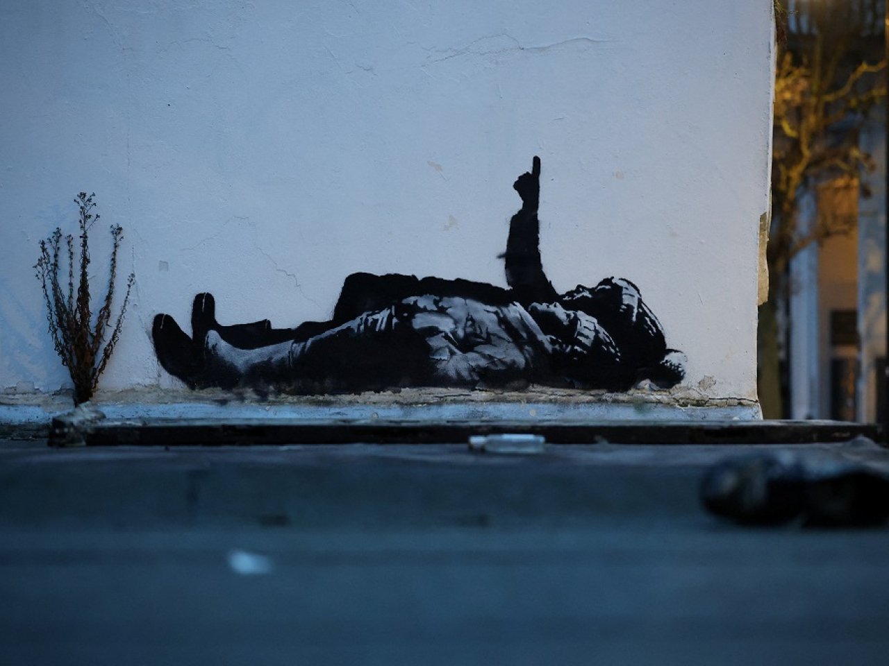 An almost identical artwork has also appeared a few miles away under the multi-storey Centre Point building in Tottenham Court Road. Photo: Reuters