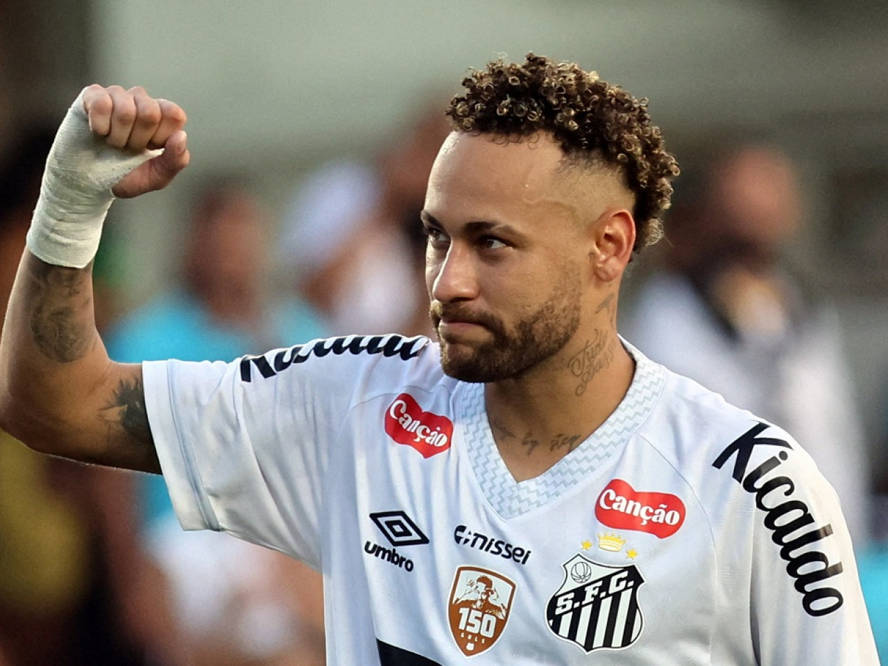 Brazilian superstar Neymar has played through the pain to help Santos avoid relegation, and is now hoping to be fit enough to feature in next year's World Cup. File photo: Reuters