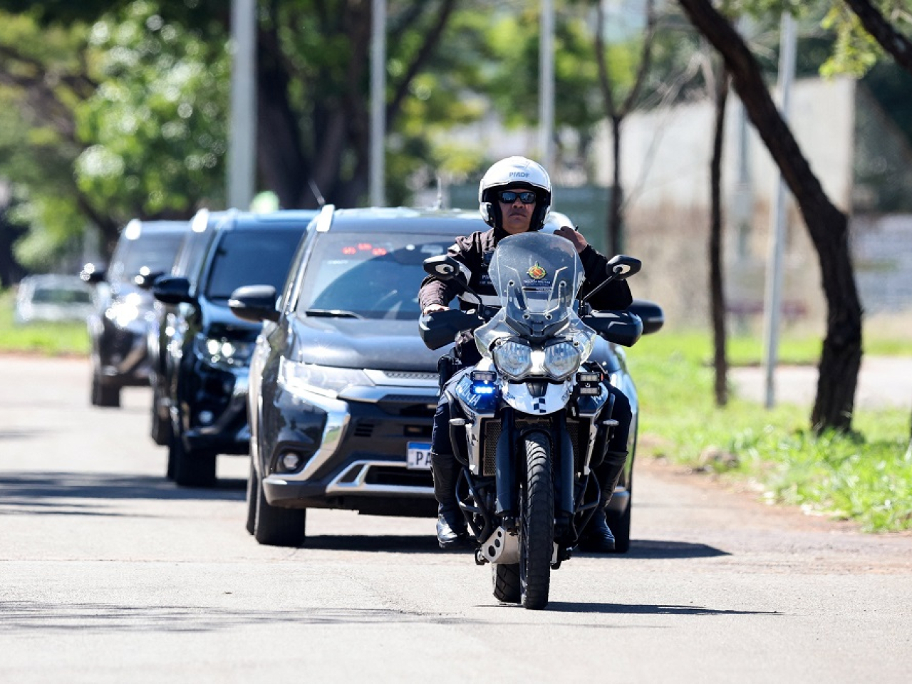 Jair Bolsonaro's trip to hospital is accompanied by heavy security. Photo: Reuters