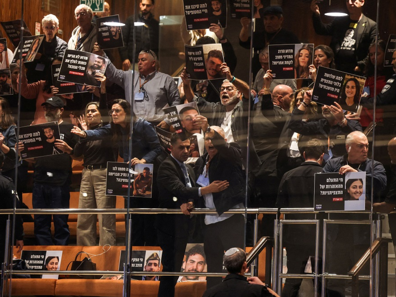 Chaos at the Knesset as members of the October Council, a group of former hostages and victims' families, stage a noisy protest against the government's plan. Photo: Reuters