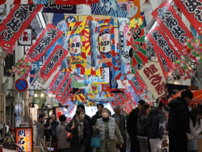 日本政府上調本財年經濟增長預測至1.1%。（法新社資料圖片）