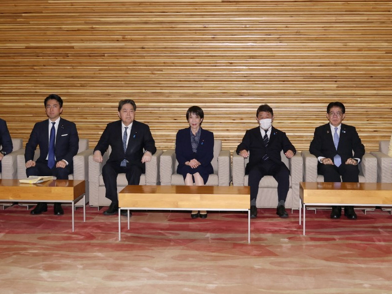 Japan's Prime Minister Sanae Takaichi, centre, and other cabinet members approved a large increase in fiscal spending with the defence budget getting a boost. File photo: AFP