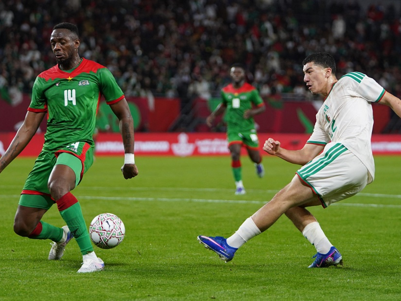 Algeria's Ibrahim Maza, right, was the man of the match as Algeria qualified for the last 16 of the Africa Cup of Nations. Photo: Reuters