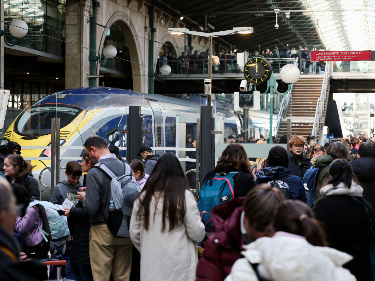 Crowds of stranded travellers swelled at Gare du Nord station in Paris. Photo: Reuters