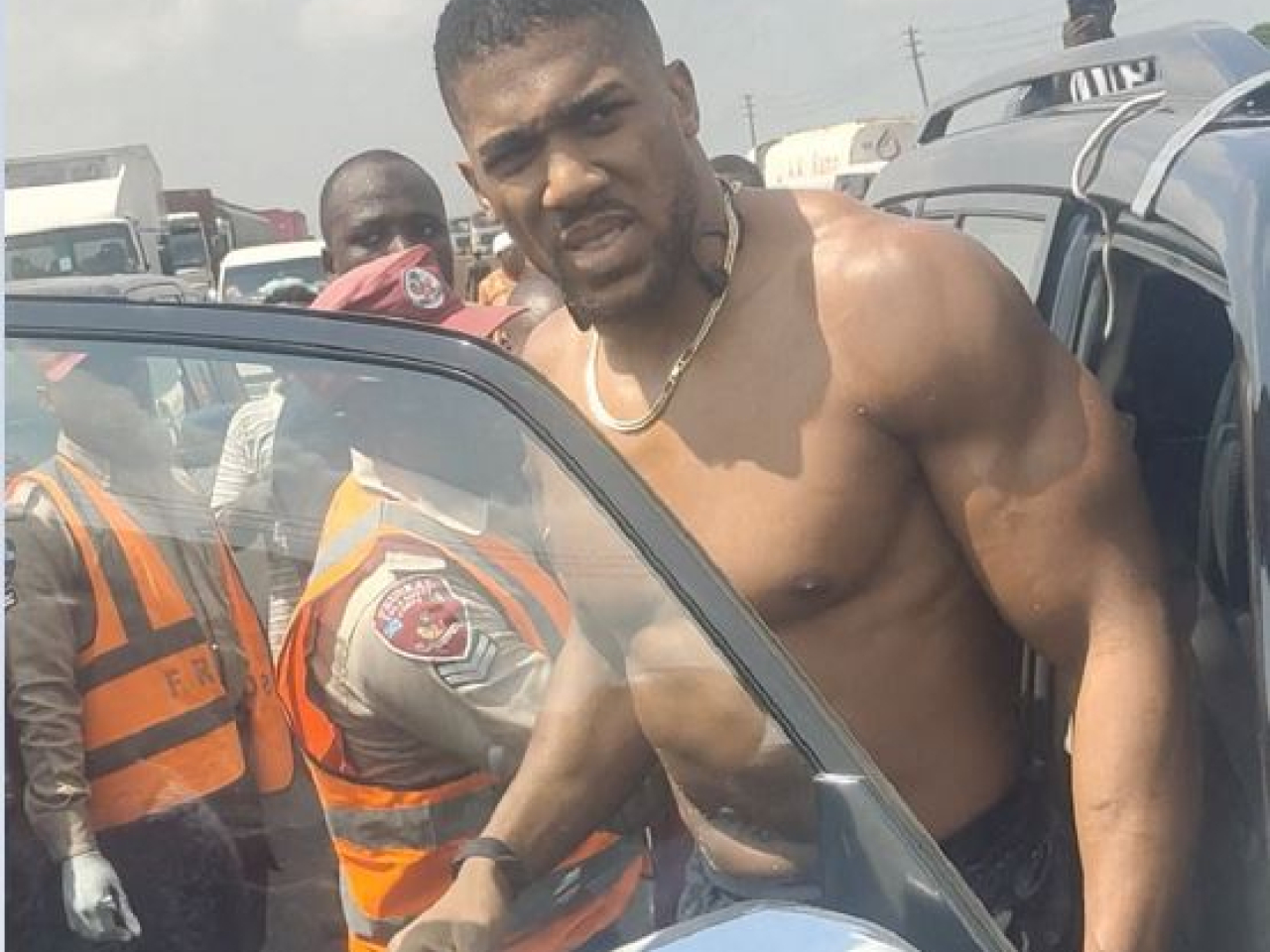 Boxer Anthony Joshua grimaces as he gets into an emergency responder's vehicle. File photo: Reuters