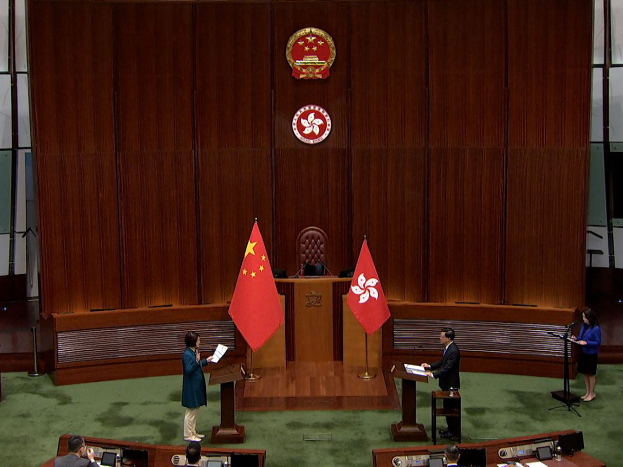 Members of the new Legislative Council take turns to make their pledges in order of seniority.