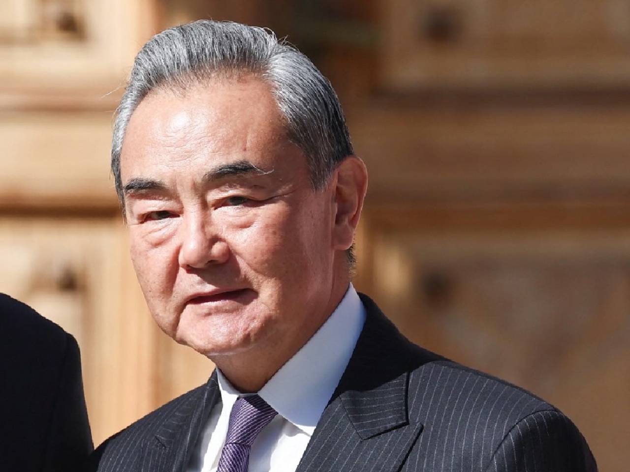 王毅指勸和促談、致力降溫熱點問題是去年國家外交貢獻之一。（法新社資料圖片）