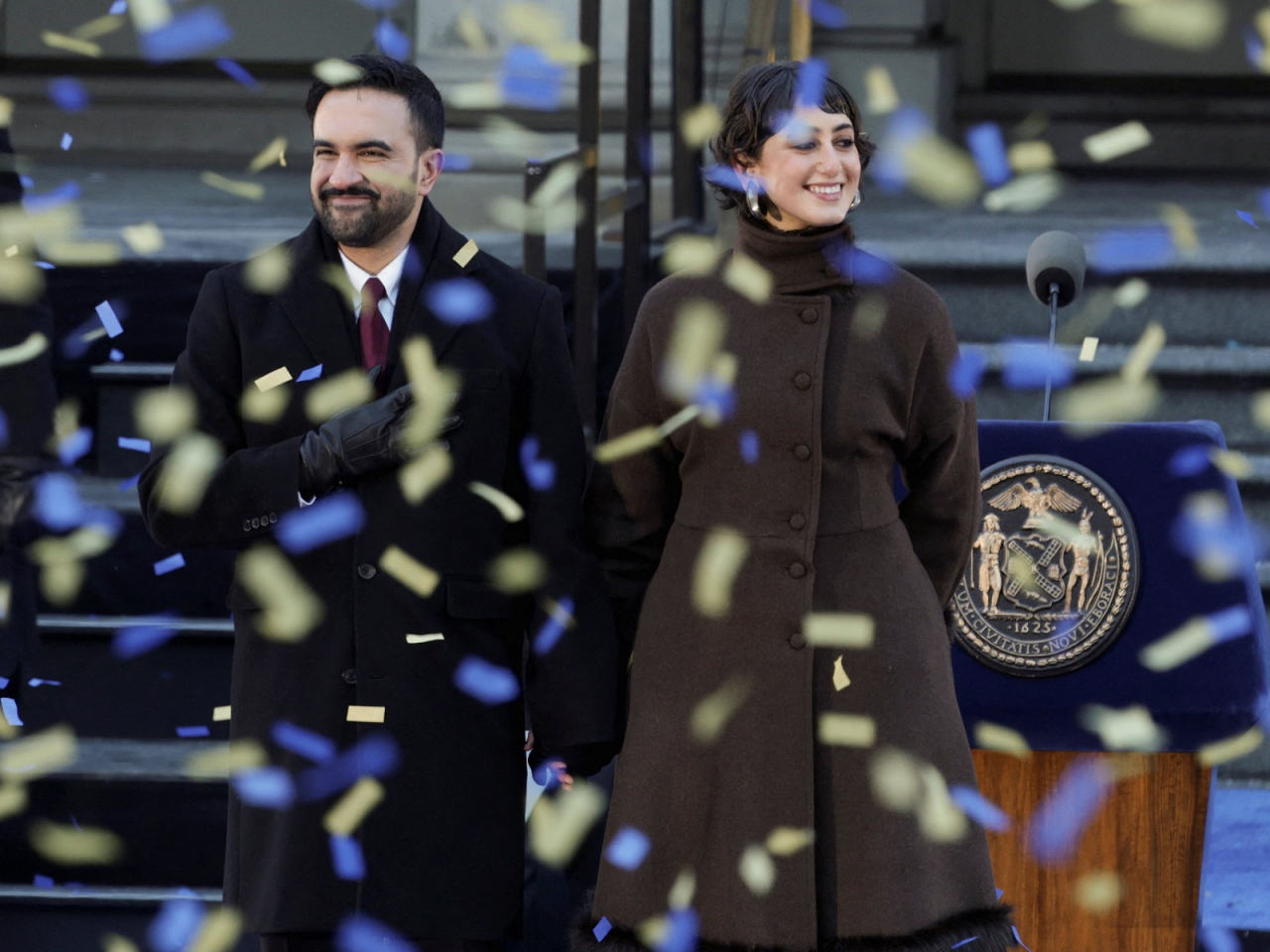 New York City Mayor Zohran Mamdani and his wife Rama Duwaji smile as confetti falls during his inauguration ceremony in New York City. Photo: Reuters