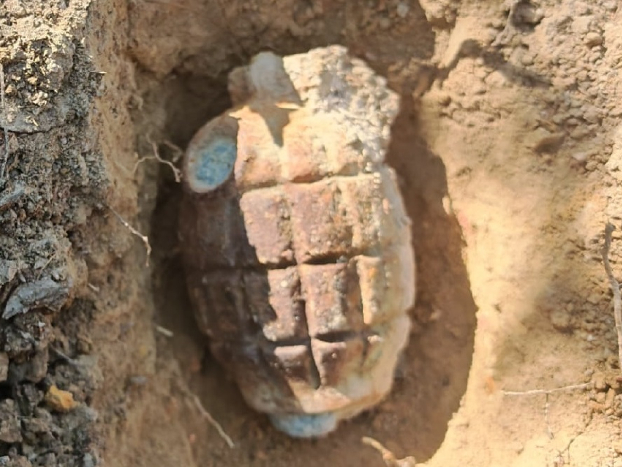 Police say the grenade was about four inches long and about two and a half inches in diameter. Photo courtesy of police