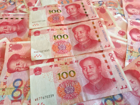 在岸人民幣收市創逾1星期低位，報6.9912兌1美元，跌99點子。（港台圖片）