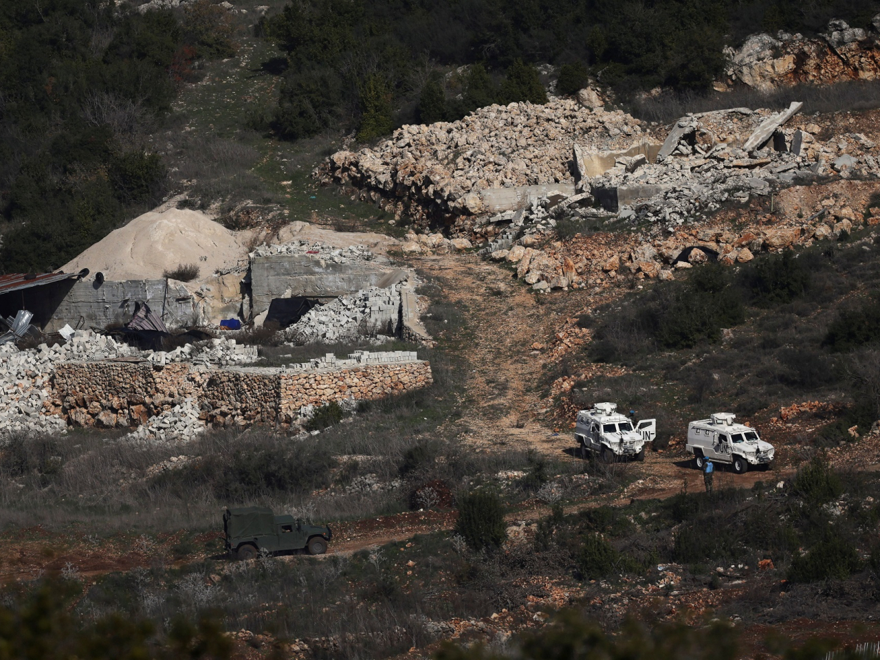 Vehicles belonging to the Lebanese army and UN security forces could be seen in southern Lebanon from northern Israel. Photo: Reuters