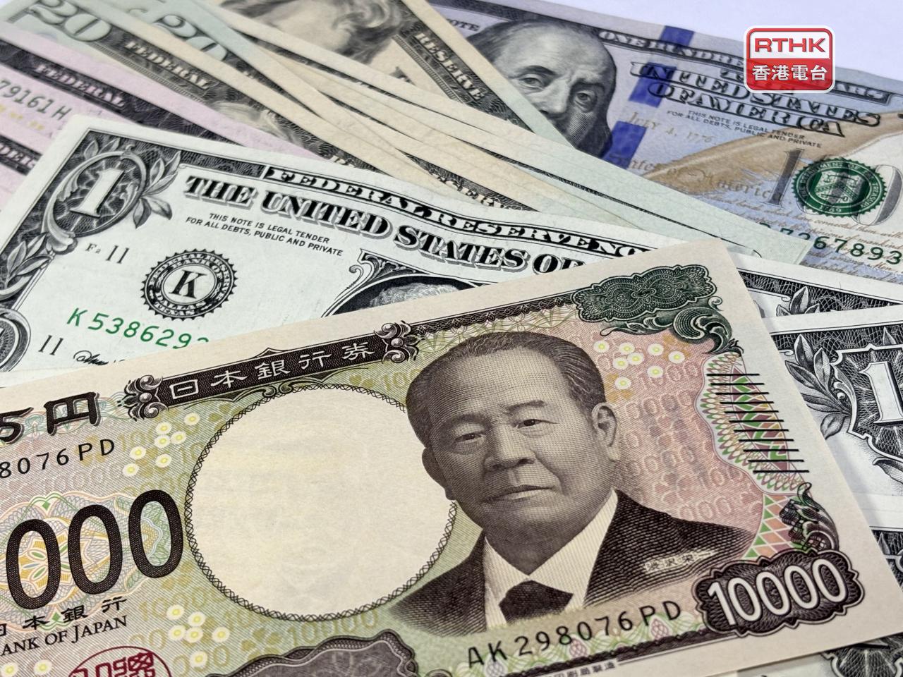 美元兌日圓一度升穿158關口，高見158.2附近，創約1年新高。（港台圖片）