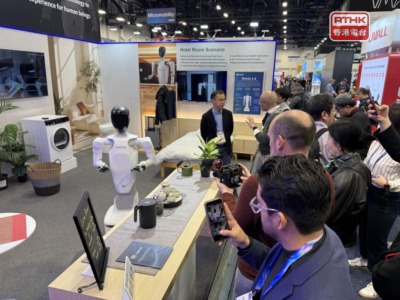 Fancy a cup of tea? UniX AI's Wanda robot promises to make users' lives easier by assisting in a number of household chores. Photo: RTHK