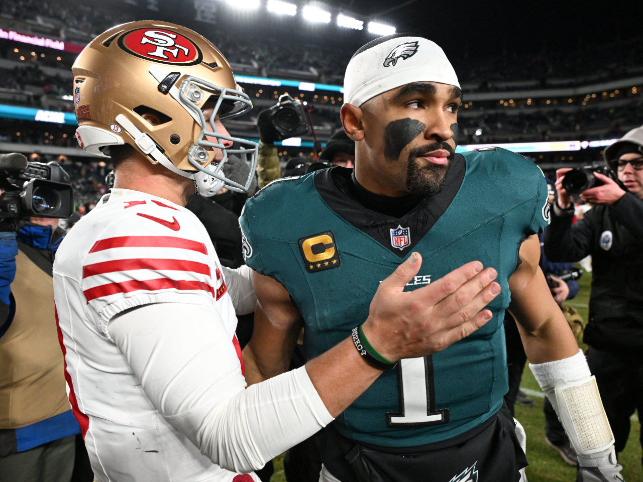 A late rally led by Eagles quarterback Jalen Hurts, right, wasn't enough to get the defending Super Bowl champions over the line. Photo: Reuters