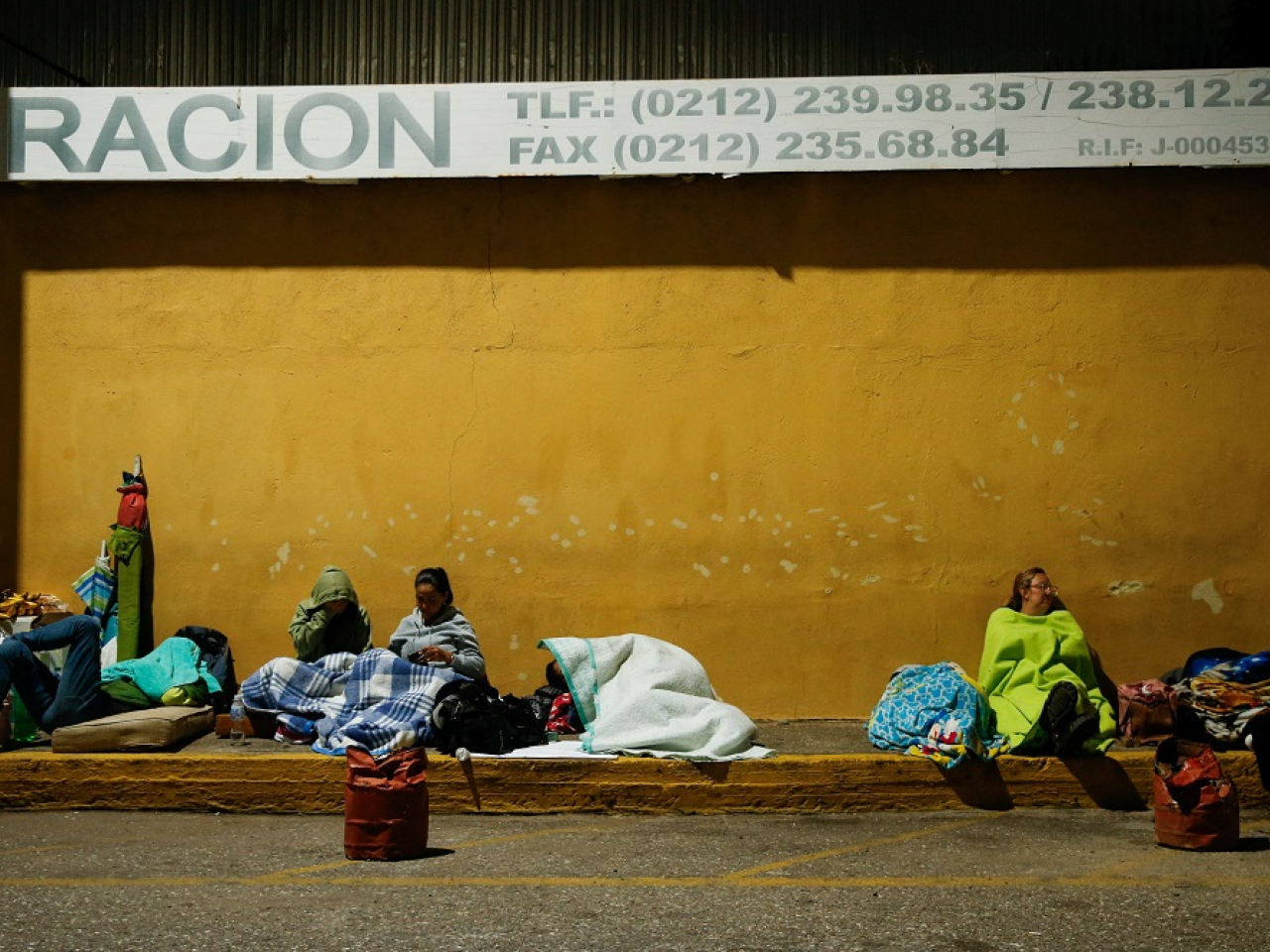 Relatives have been camped out at prisons and detention centres since the authorities began releasing prisoners last week. Photo: Reuters