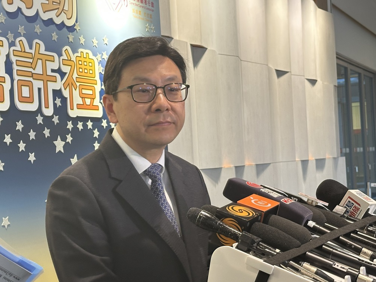Welfare Secretary Chris Sun says companies should not cut staff hours to avoid providing paid rest days and holidays. Photo: RTHK