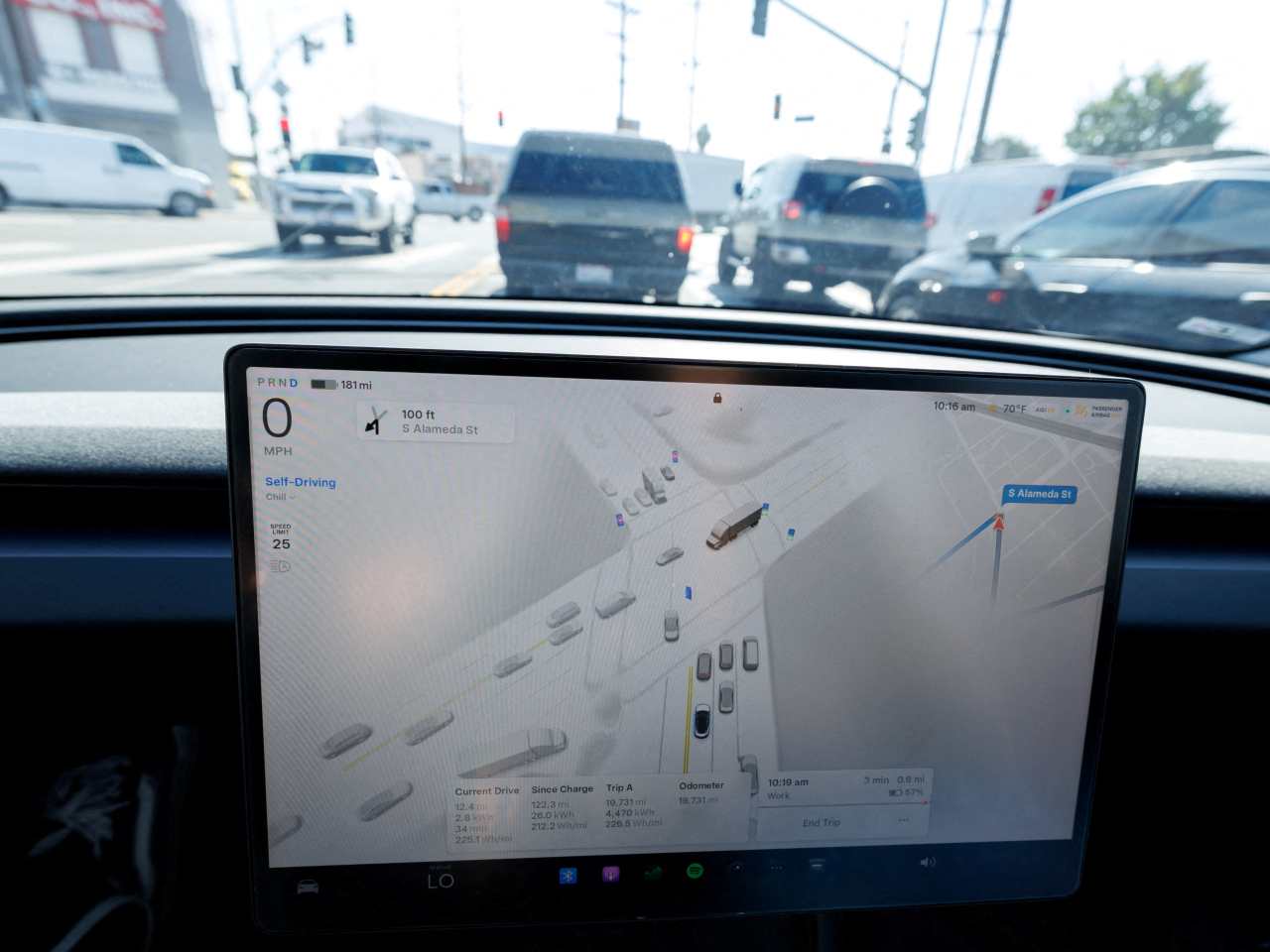Tesla's full self-driving software enables its vehicles to change lanes and obey traffic &zwnj;signals on city ⁠streets. File photo: Reuters