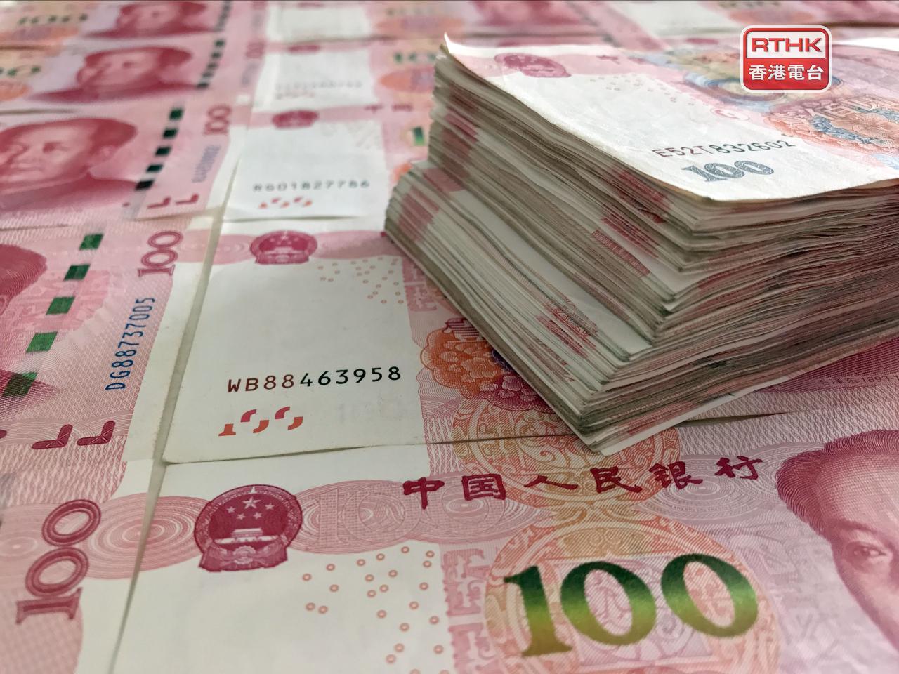 在岸人民幣收市報6.9734兌1美元，較上日收市升31點子，創逾兩年半高位。（港台圖片）