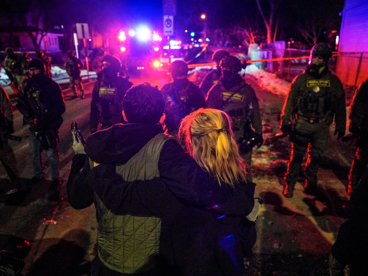 Protesters stand in front of police, as tensions rise after federal agents were involved in another shooting incident in Minneapolis. Photo: Reuters