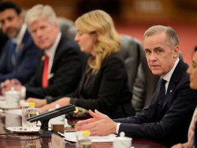 卡尼說雙方應專注於農業、能源及金融等能夠取得最即時進展的領域。（路透社）