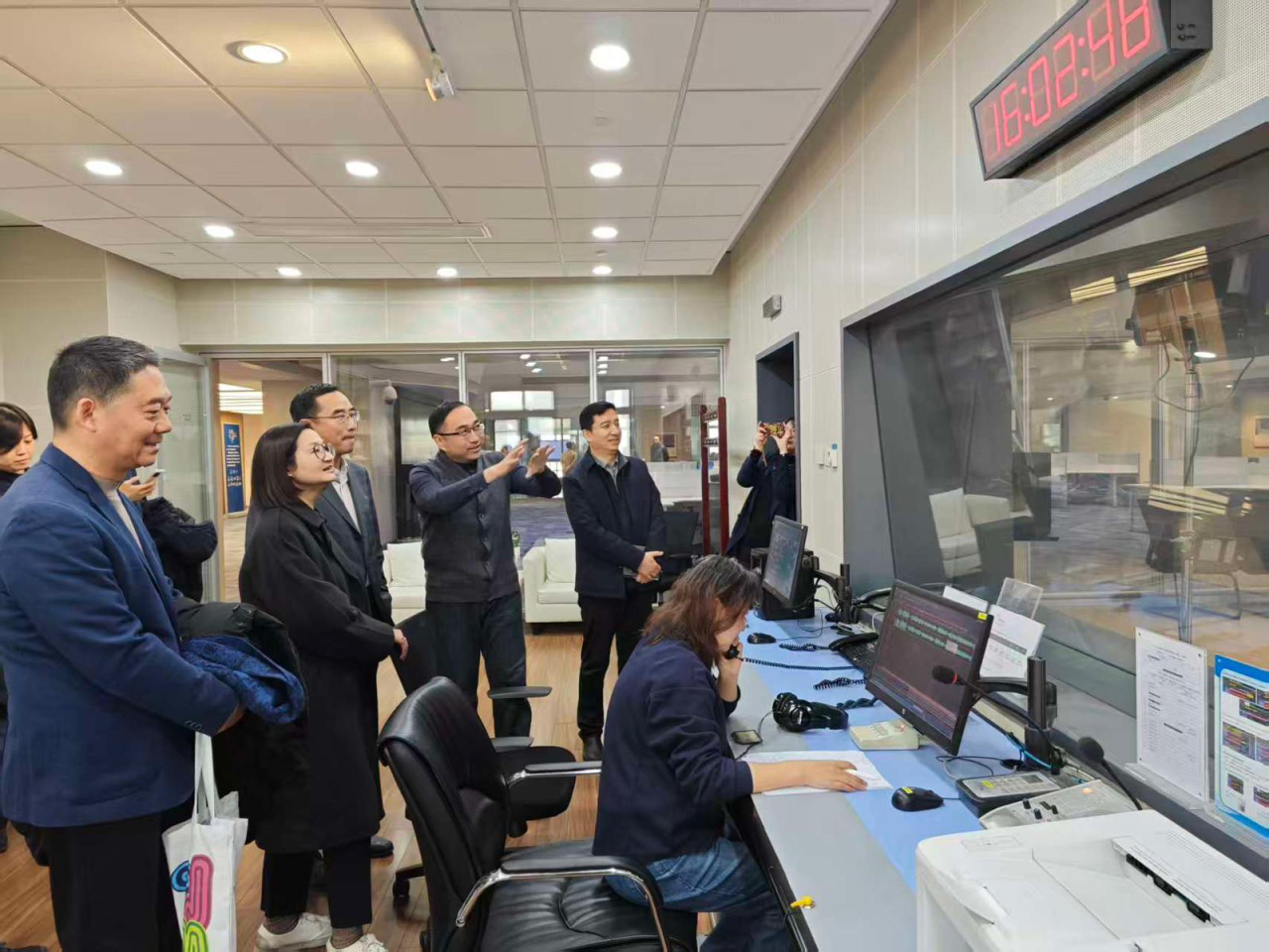 The RTHK delegation gets a peek at a Beijing Radio & Television Station broadcast. Photo: RTHK