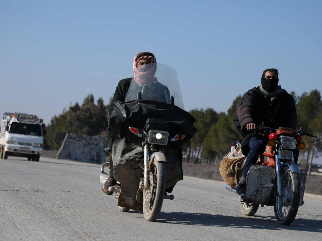 Civilians of Dayr Hafir flee west fearing an escalation between Kurdish-led Syrian Democratic Forces and Syrian government. Photo: Reuters