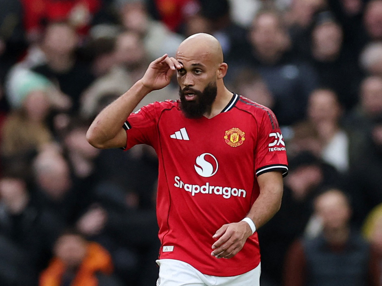 Manchester United's Bryan Mbeumo celebrates scoring their first goal against Manchester City. Photo: Reuters