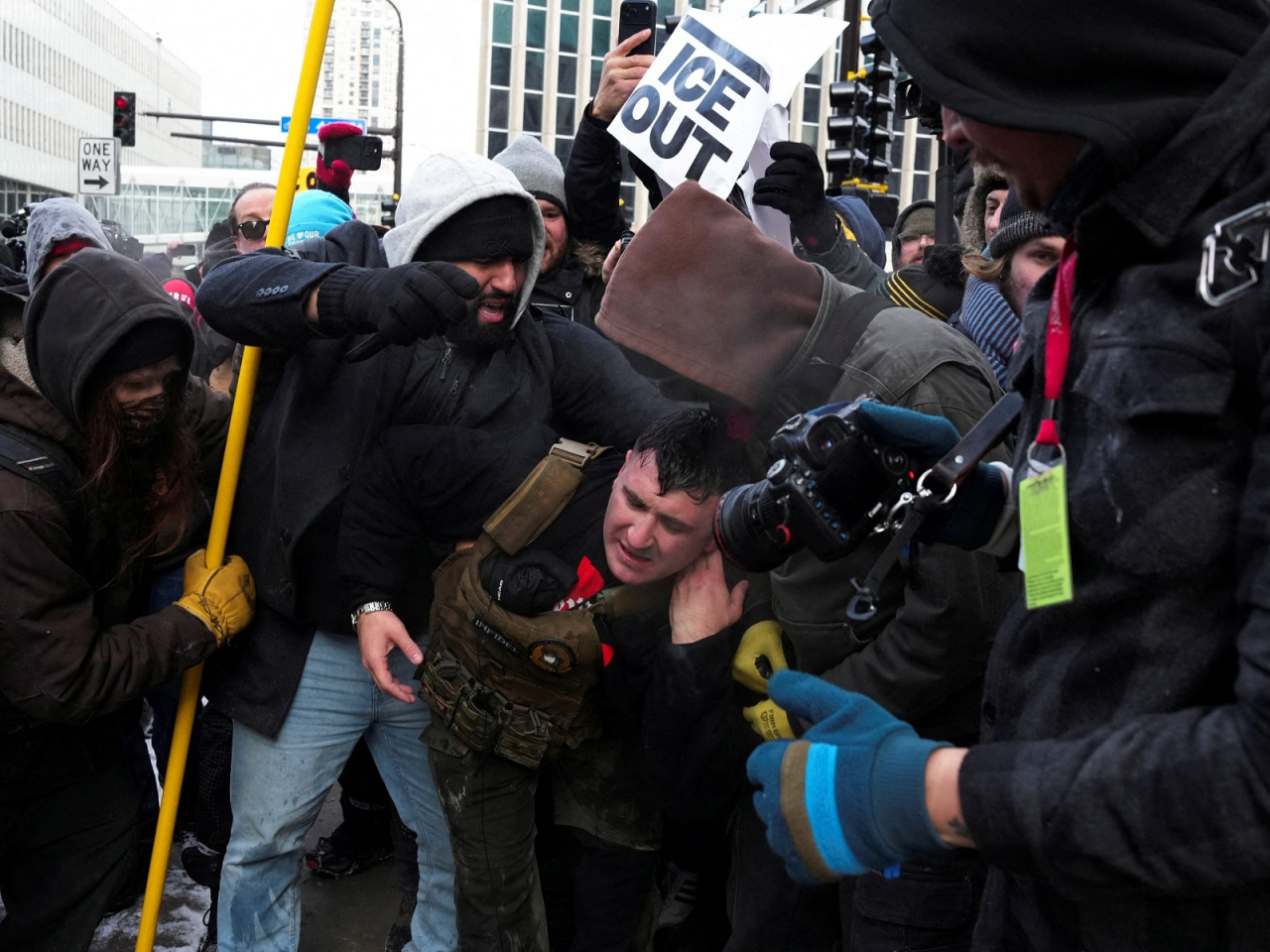 Right-wing influencer Jake Lang appeared to be injured following clashes between pro- and anti-ICE protesters in Minneapolis. Photo: Reuters
