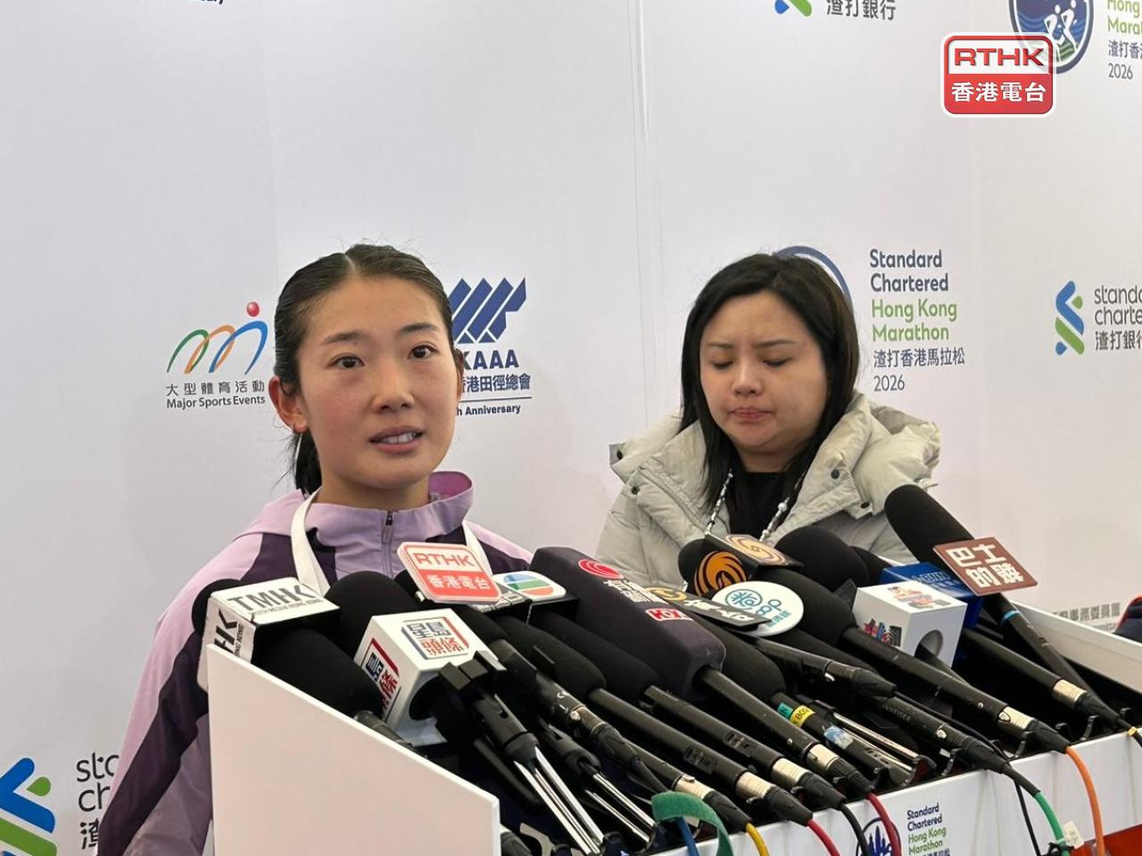 Virginia Lo (left) said she felt it was an off day, despite being the top local runner to finish the marathon. Photo: RTHK