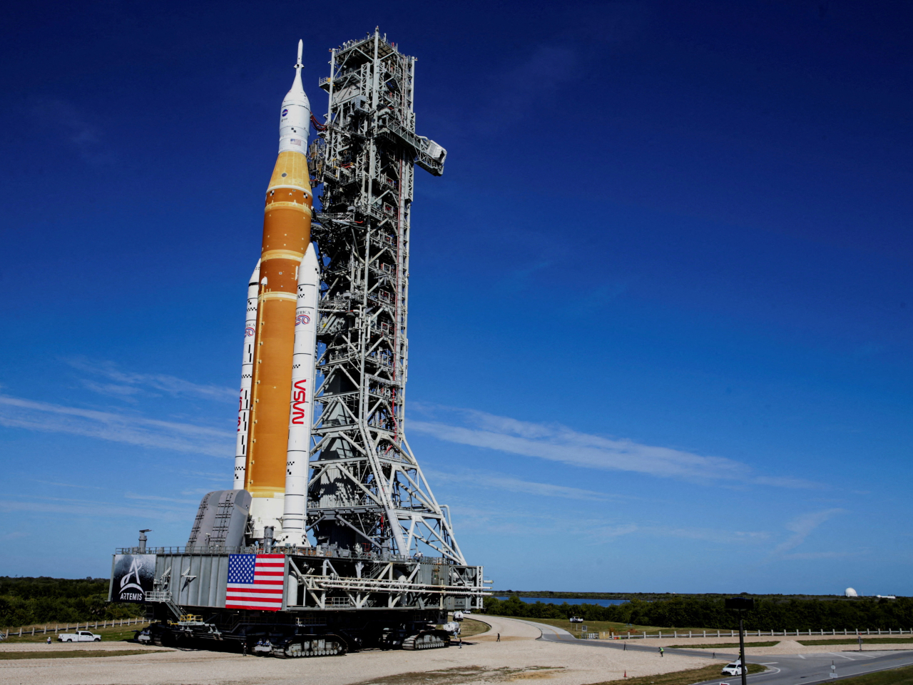 Nasa's next-generation moon rocket, the Space Launch System rocket with the Orion crew capsule, rolls to the launch pad at the Kennedy Space Center in Florida. Photo: Reuters