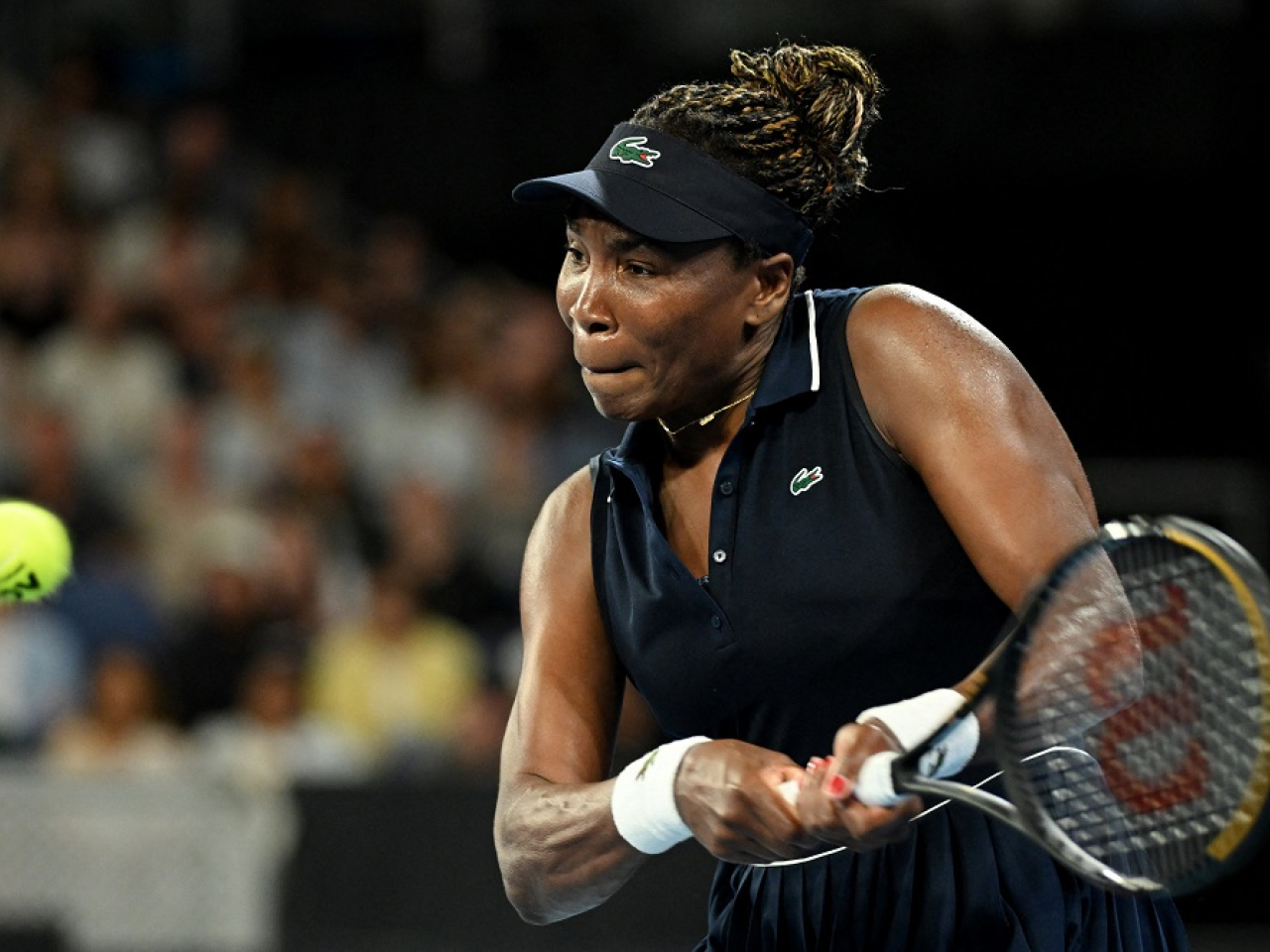 Venus Williams of the US in action during her first round match against Serbia's Olga Danilovic. Photo: Reuters