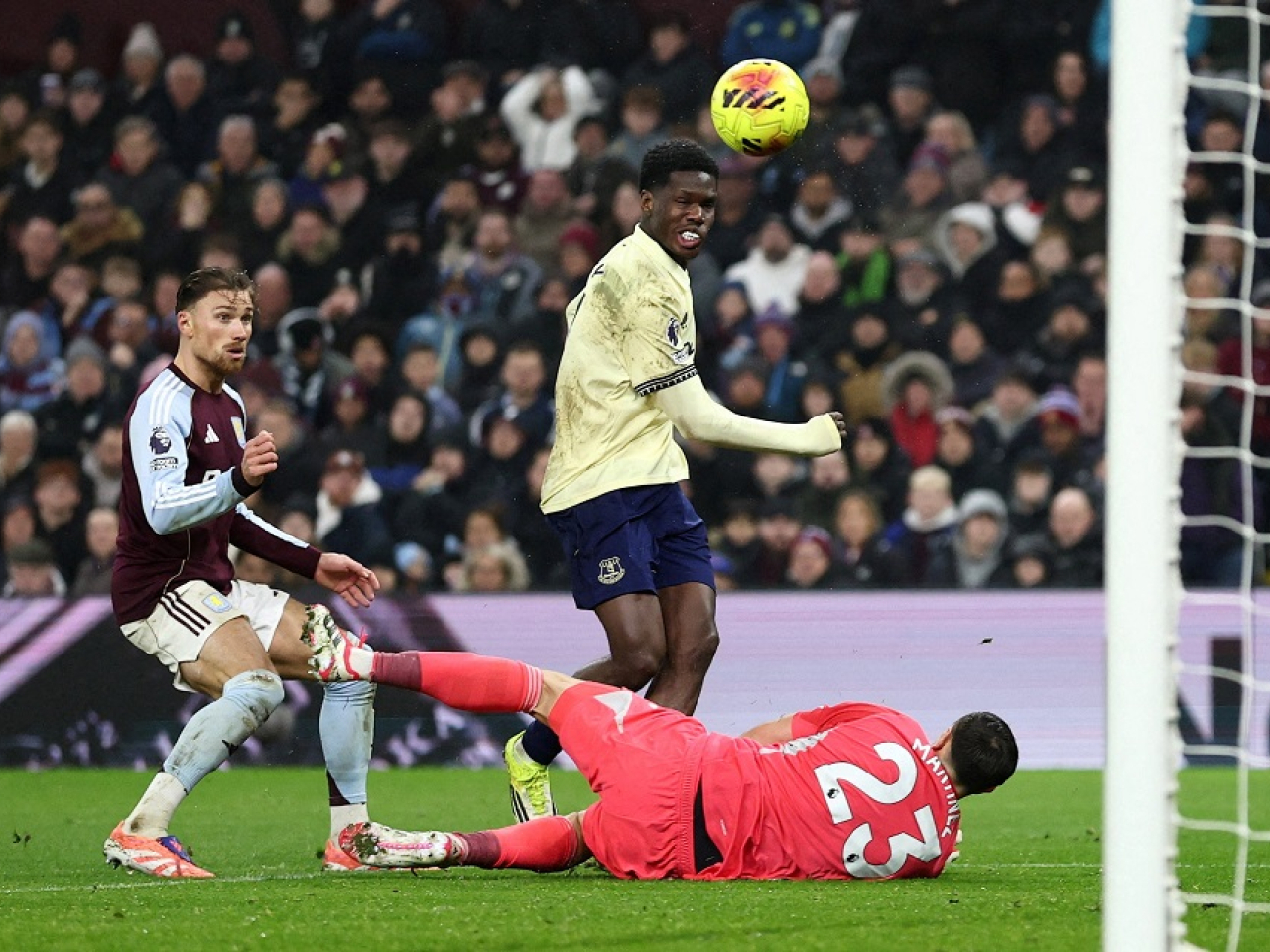 Matty Cash watches in disbelief as Thierno Barry chips the ball over Emiliano Martinez for Everton's winner. Photo: Reuters